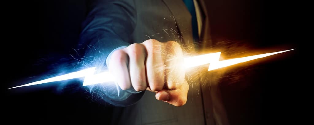 Photo of hand holding a lightning bolt