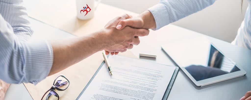 Photo of business owners agreeing to dissolution