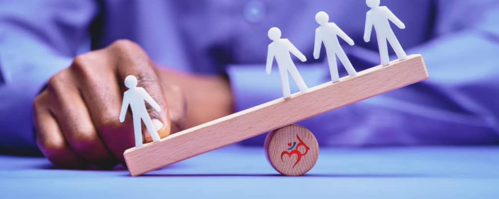 Photo of person tipping a scale in favor of a person outnumbered 3:1.