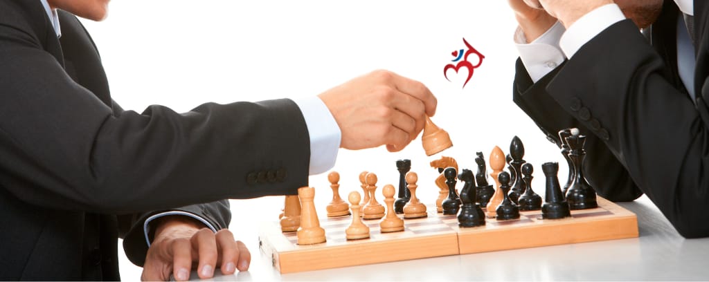 Photo of business person losing a chess match