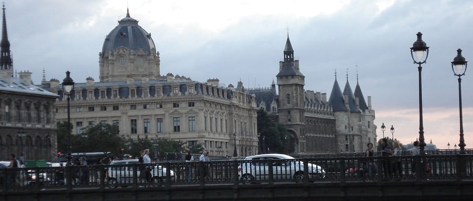 Photo of the Seine River flowing through Paris on a gloomy day.