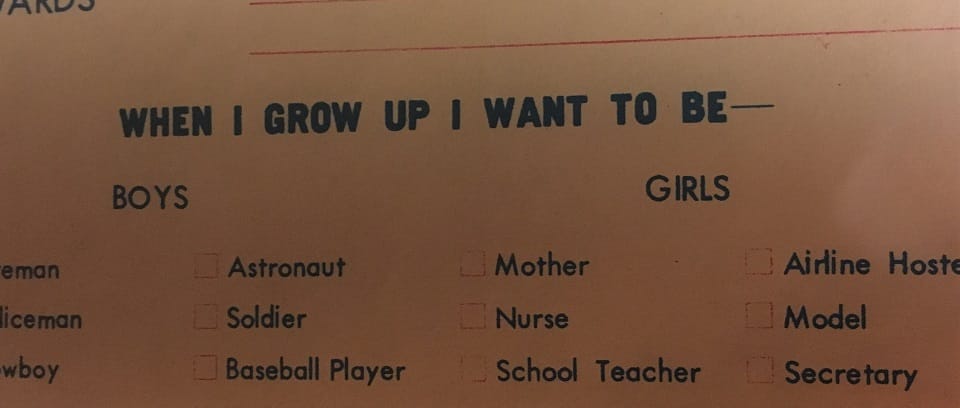 Photo of text from 1970s elementary school memory book limiting girls to roles such as mother, nurse, and school teacher.