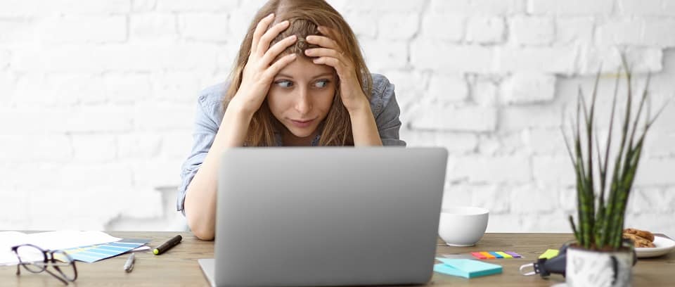 Photo of frustrated employer facing worker misclassification penalties