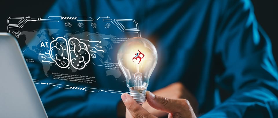 Photo of worker at a laptop holding a lightbulb while an AI brain "thinks"