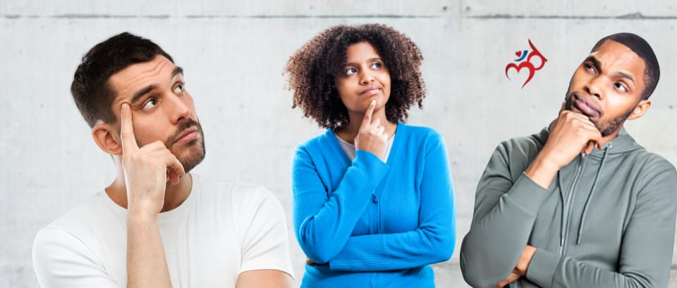 Photo of three workers thinking