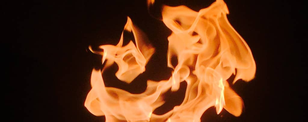Photo of flames on a dark background
